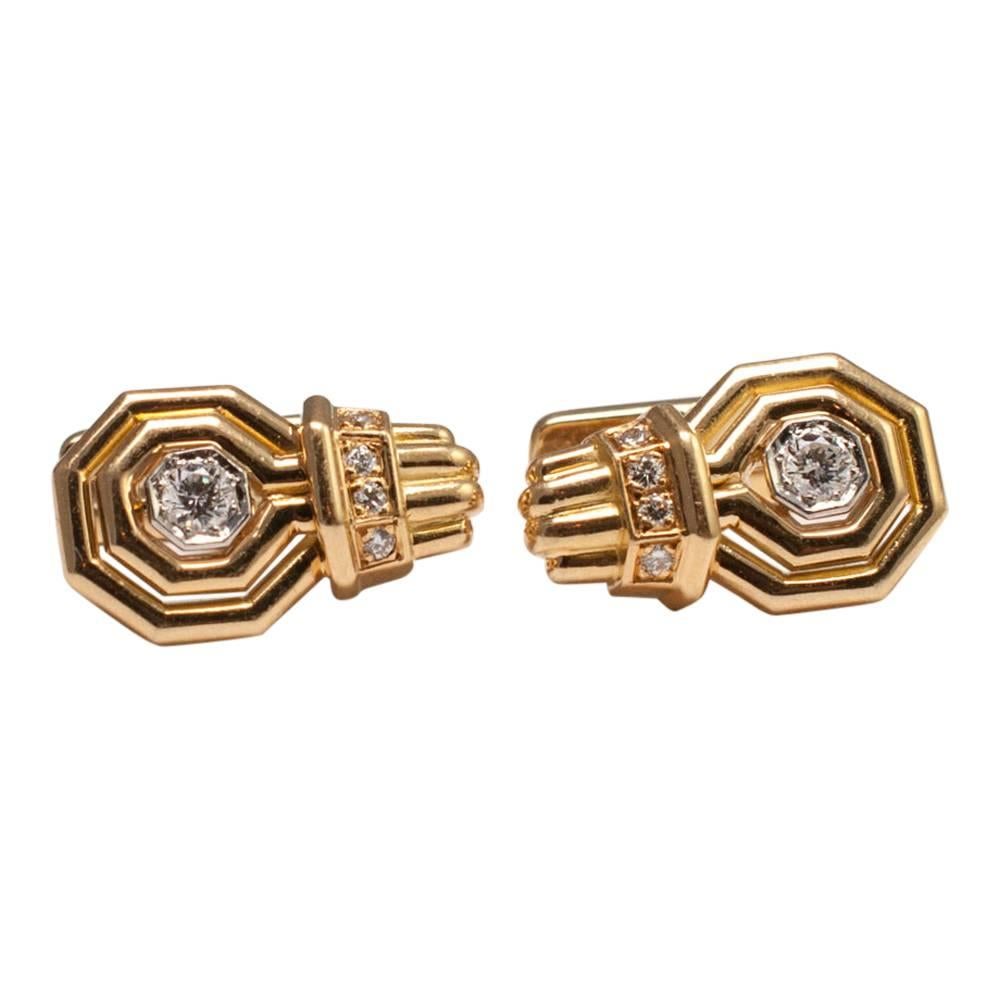 Chaumet, Paris 18ct gold and diamond cufflinks; each cufflink is set with a brilliant cut diamond in an octagonal setting and 4 smaller diamonds.  Total diamond weight 0.64ct.  Signed Chaumet Paris and stamped with the French state control mark for