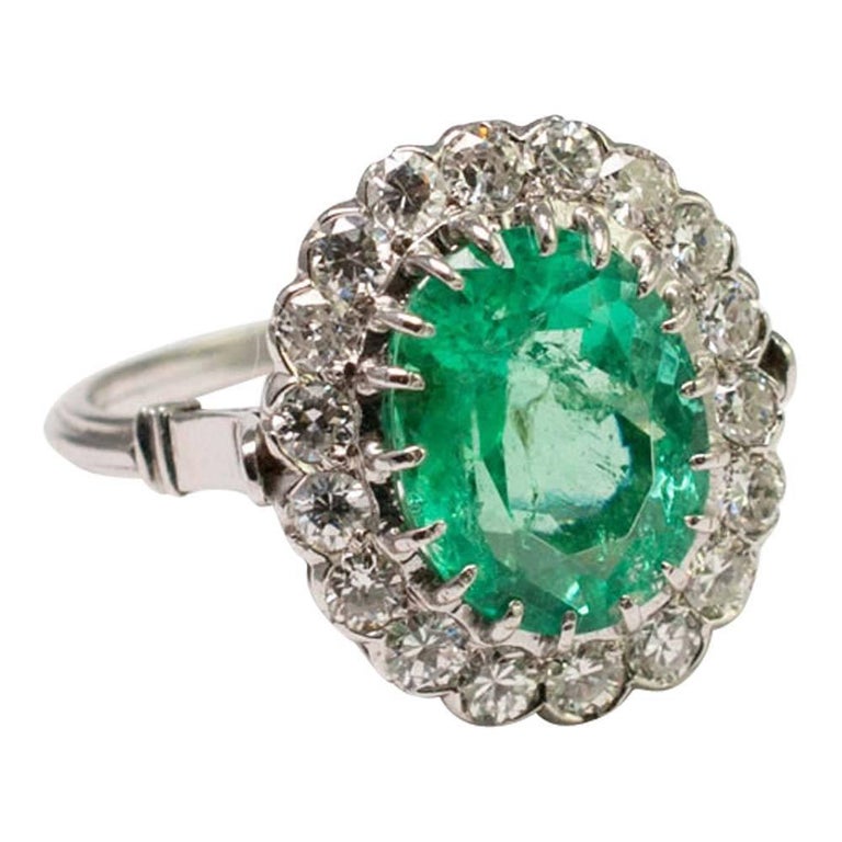 1930s Colombian Emerald Gold Halo Ring at 1stDibs