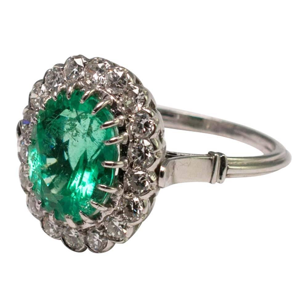 1930s Colombian Emerald Gold Halo Ring In Excellent Condition In ALTRINCHAM, GB