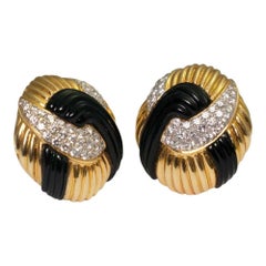 Circa 1970s Onyx Diamond 18 Carat Gold Round Knot Stud Earrings