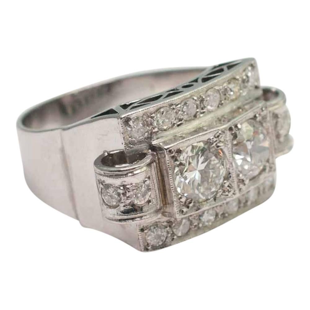 Stylish Art Deco diamond cocktail ring.   This classic style ring from the 1930s-40s has been handmade and is set with two transitional cut diamonds, each weighing 0.60ct (approx) which surrounded by Old European cut diamonds weighing 0.50ct
