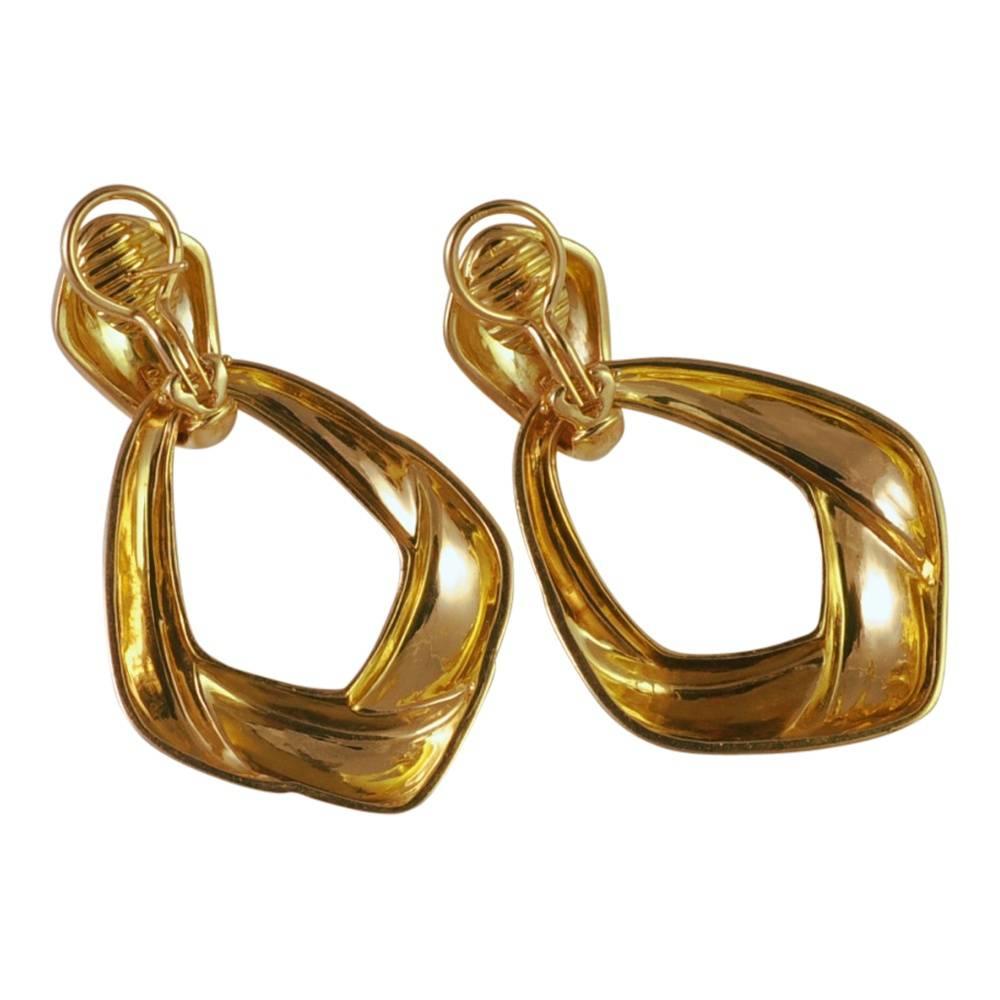 Tiffany & Co. 18ct gold Night and Day earrings.  The top section is fitted with a clip and post for added security and can be worn alone during the day and the larger, lower piece added for a more dramatic effect.  Weight 35.2gms; measurements