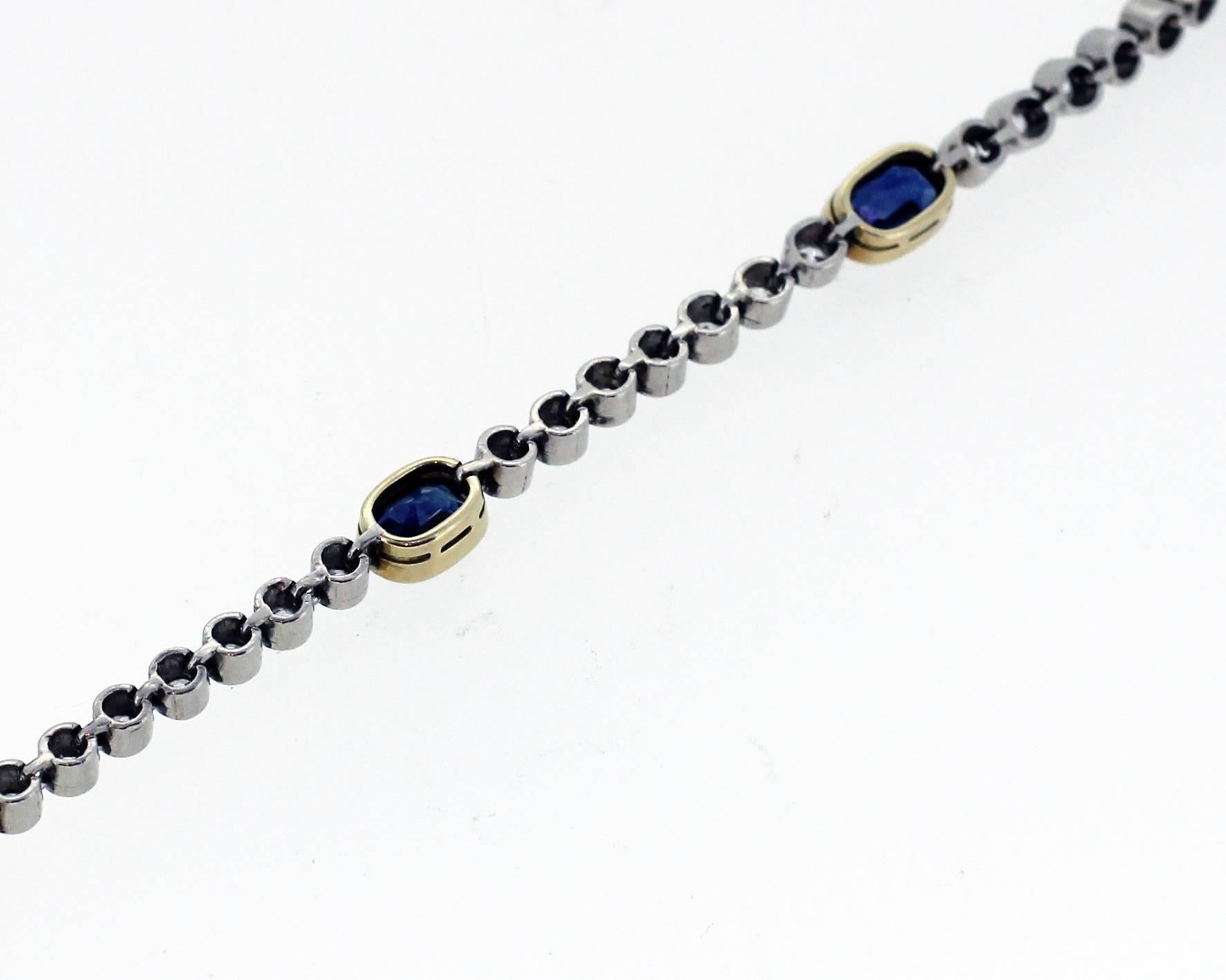 Edwardian sapphire and diamond bracelet mounted in platinum and 18ct gold. English. Circa 1910. Each oval sapphire set in an 18ct gold collet in between collet set round diamonds. Sapphires likely to be Ceylon in Origin. Total sapphire weight