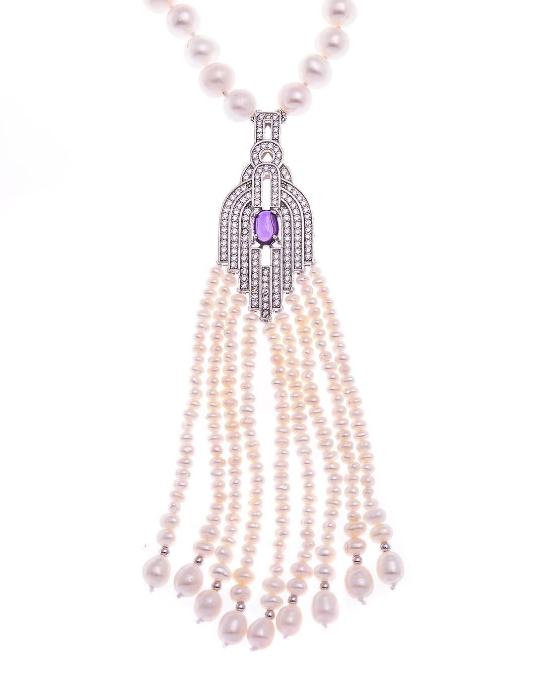 Take a step back in to the Roaring Twenties with this Great Gatsby inspired necklace. With over 32" over gleaming Freshwater pearls, all individually knotted and matched with inspiring perfection, this Opera length necklace can be worn down the