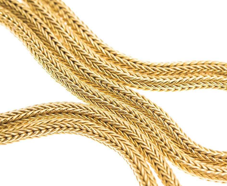 This delicious and tactile shimmering gold chain is fashioned in the Etruscan style. Fabulous gold wire crafted into a weighty and sumptuous 18ct chain. A wonderful gift of gold and a beautiful chain to be worn alone or with an amulet or pendant.