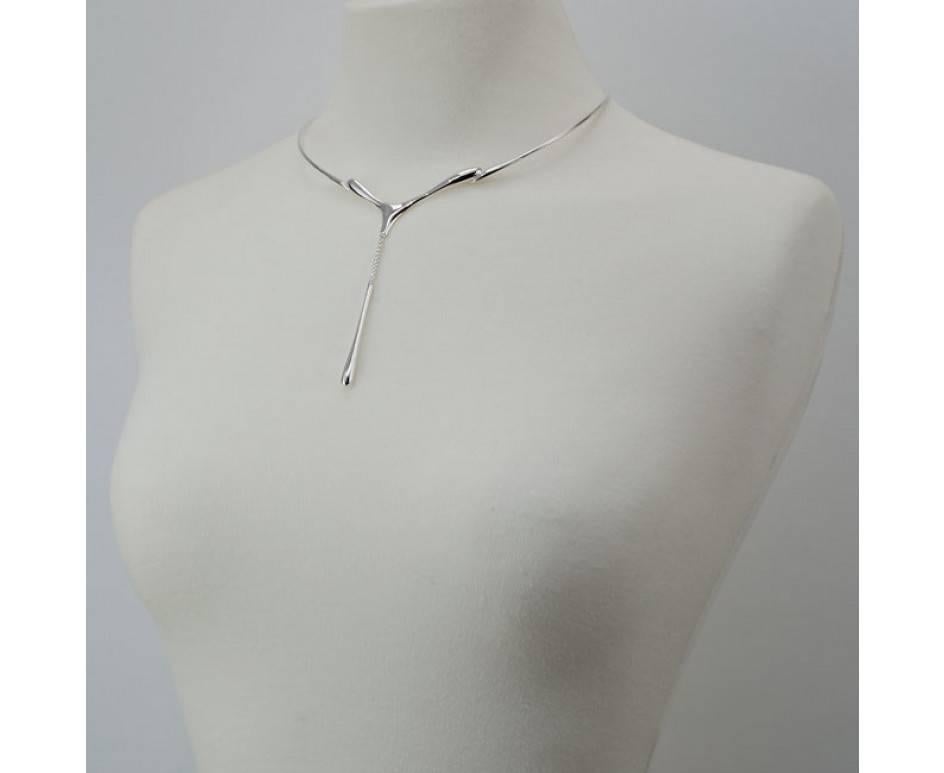 Drip Collection

Inspired by the beauty of water. Elegant Drips of water that are created by nature and formed to give a molten Silver effect.

Elegant piece from the Drip collection. Y-shaped necklace of solid Sterling Silver featuring large drip
