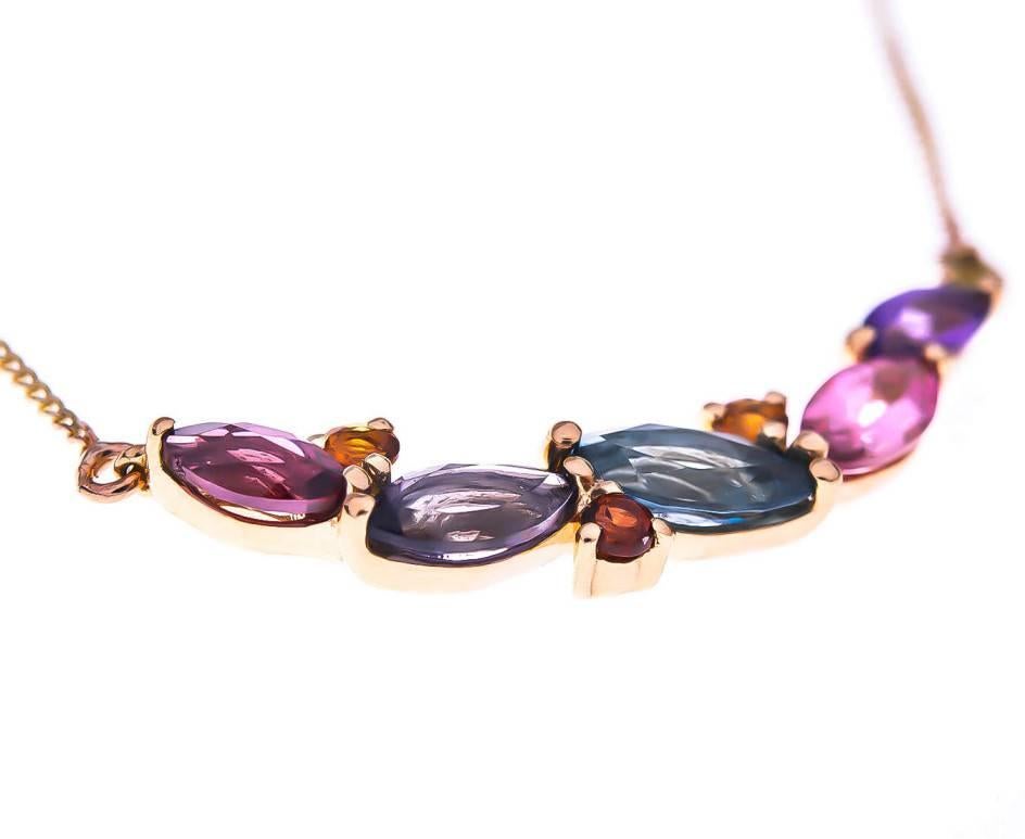 The most fabulous and dazzling piece of neckwear, perfect for cruising, cocktail parties and full on fun. Set with a dazzling array of London Blue Topaz, garnet, spinel, iolite, amethyst and peridot, this necklace be worn with black, blue, green -