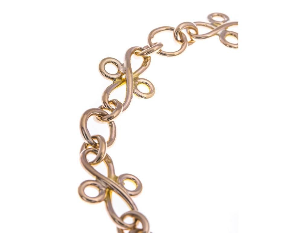 A stylish and elegant vintage bracelet made up of 9ct yellow gold. This beautiful piece consists of double figure of eight inks and circular link spacers with each of the figure of eight links being hallmarked. A lovely gift for a gold