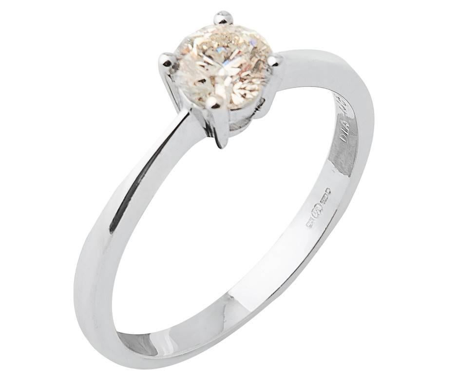 Ask for her hand in marriage with this beautifully simple diamond solitaire ring. Certified by Birmingham's Anchorcert laboratory, report number 20023177 as 0.52ct, colour G, clarity I1 this lovely white round brilliant cut diamond is set in 18ct