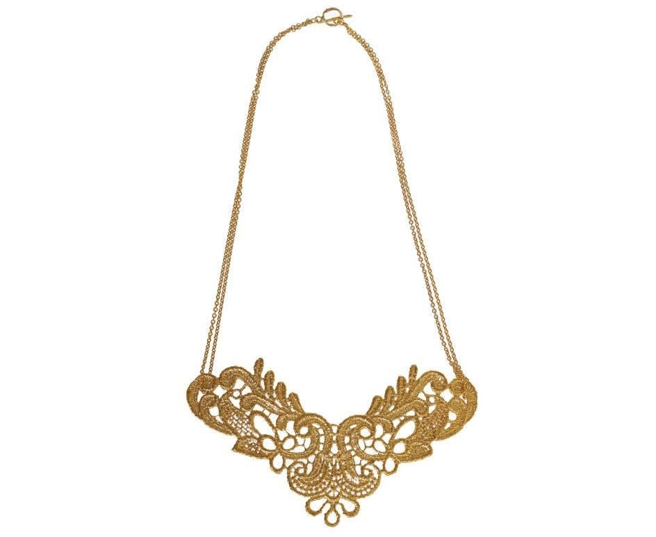 I Love A Lassie

A collection founded from fragments of antique lace found in a collectors attic. This solid sterling silver neckpiece is a huge statement piece ideal for Bridal wear and glamorous occasions. Cast from a section of beautifully