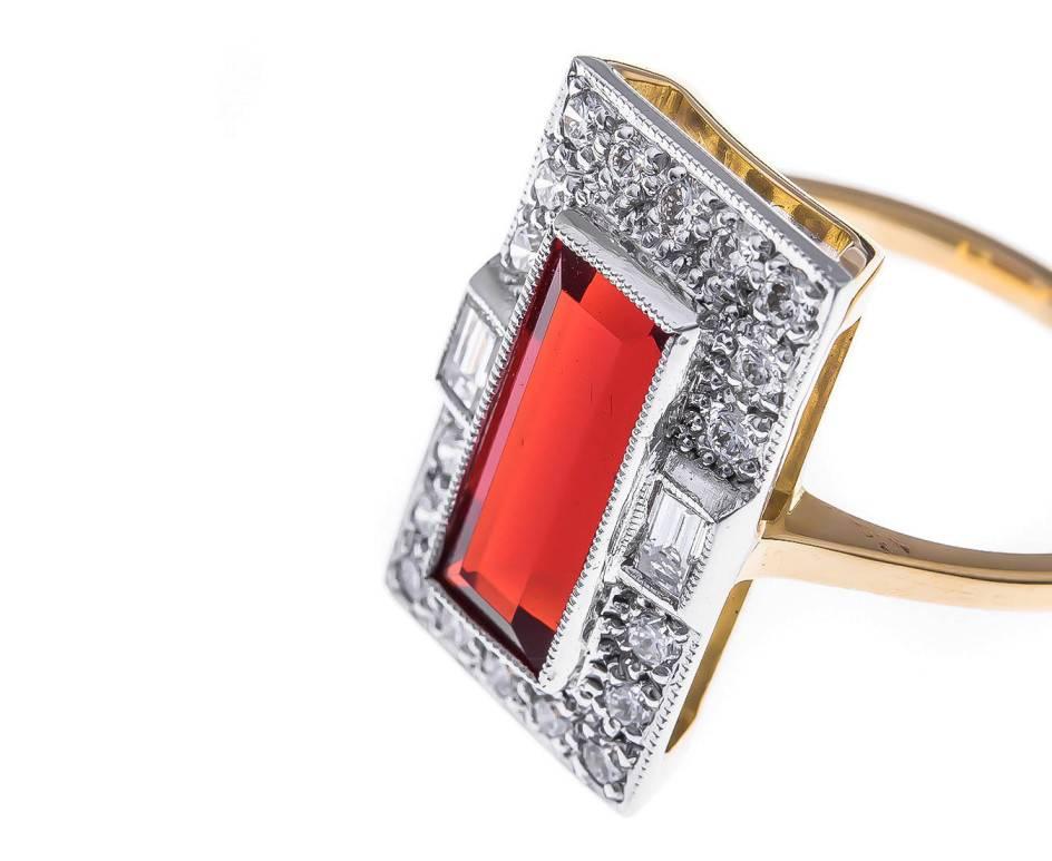 Crafted using models from the 1920's, this fabulous Art Deco design is fashioned in Britain using only the finest fire opal and diamonds. Strong and vibrant, stand out from the crowd with this statement jewel.

SPECIFICATION
Weight