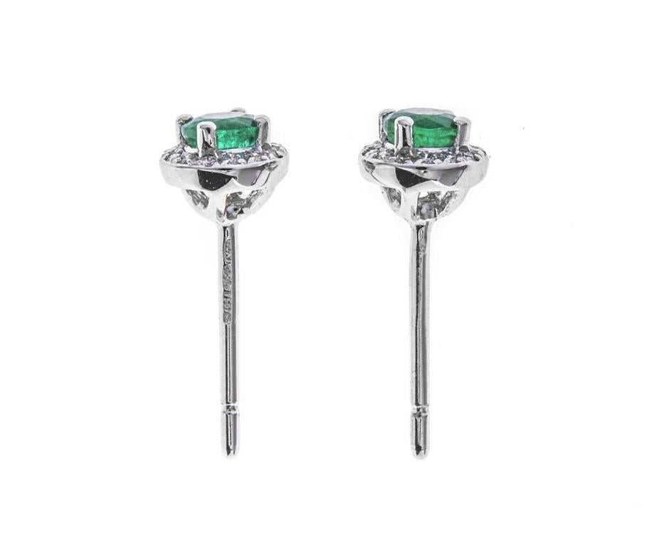 Modern 18 Carat White Gold Emerald and Diamond Earrings