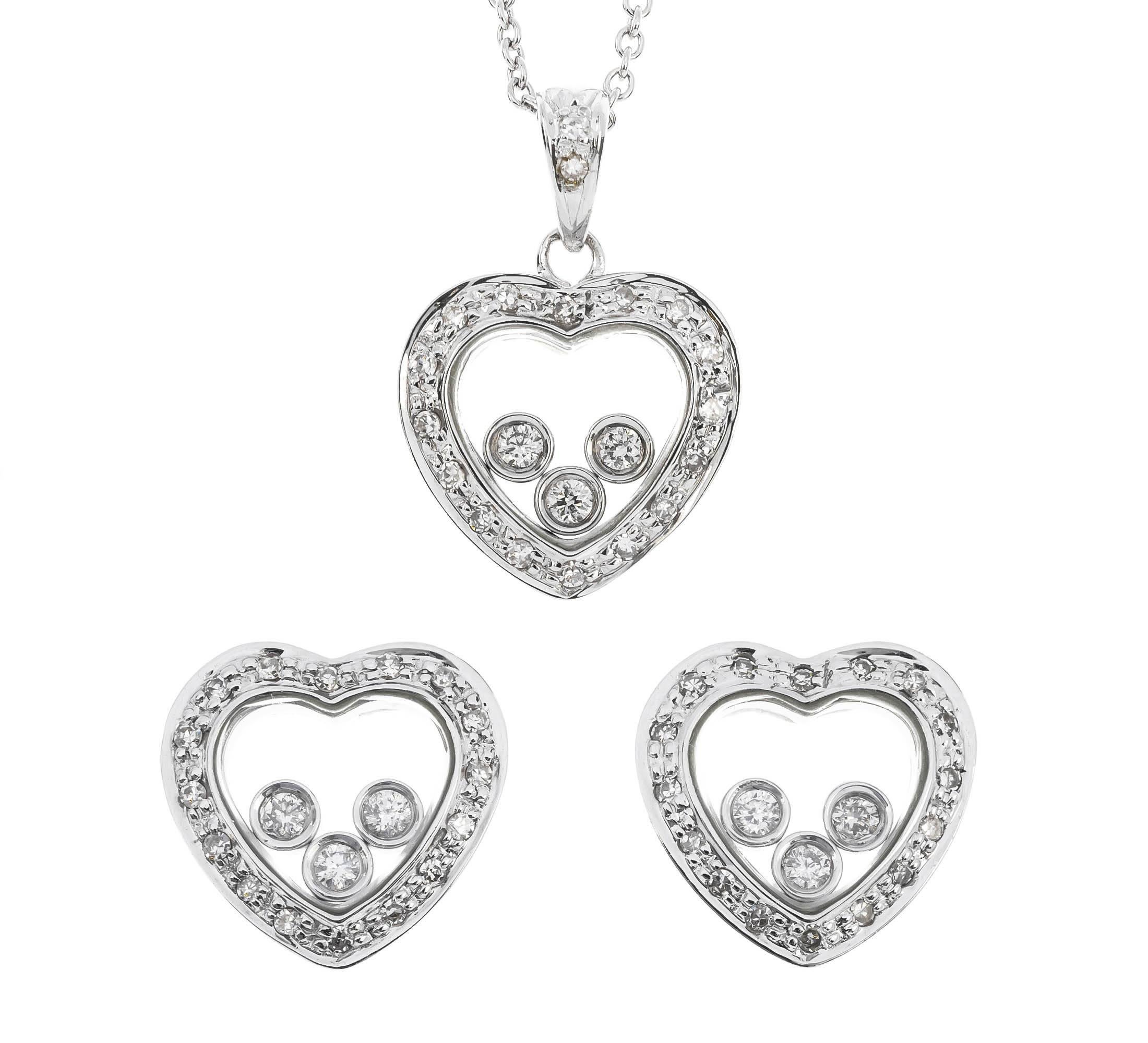Round Cut Floating Diamond Heart Earrings For Sale