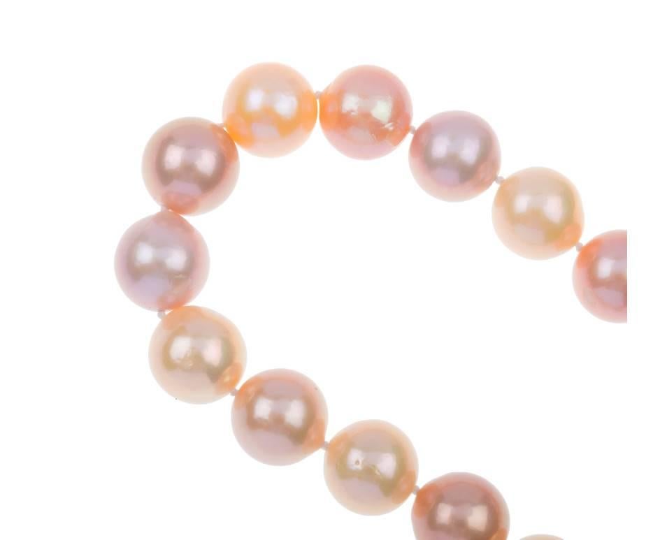 Modern Natural Pink Edison Pearl Strand with 9 Carat Gold Clasp For Sale