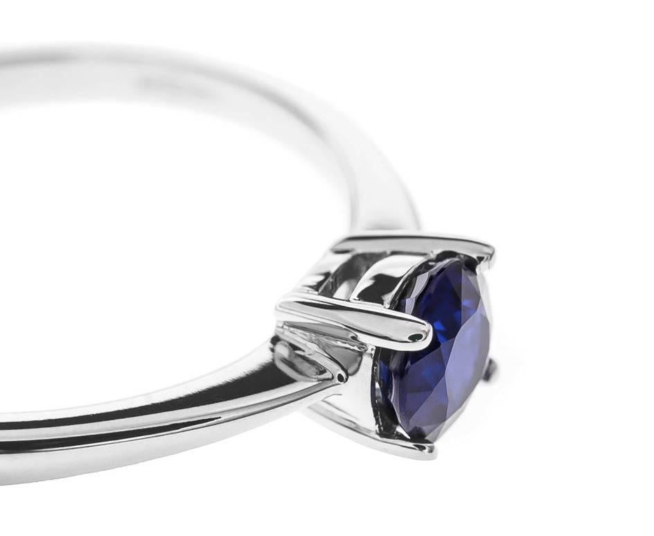 A rich royal blue sapphire set in cool white 18ct gold makes this a fabulous and striking solitaire ring. An unusual take on the classic engagement ring, an ideal "something blue" or a beautiful gift for a September birthday.

Designed,