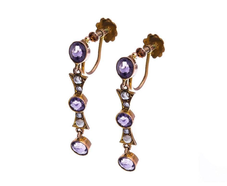Designed as a scrumptious amethyst and luxurious split pearls. These pretty earrings are the perfect pair for a summers evening.

A lovely gift for a February birthday.

SPECIFICATION
Weight (grams)	1.85
Fineness	9ct
Metal	Yellow