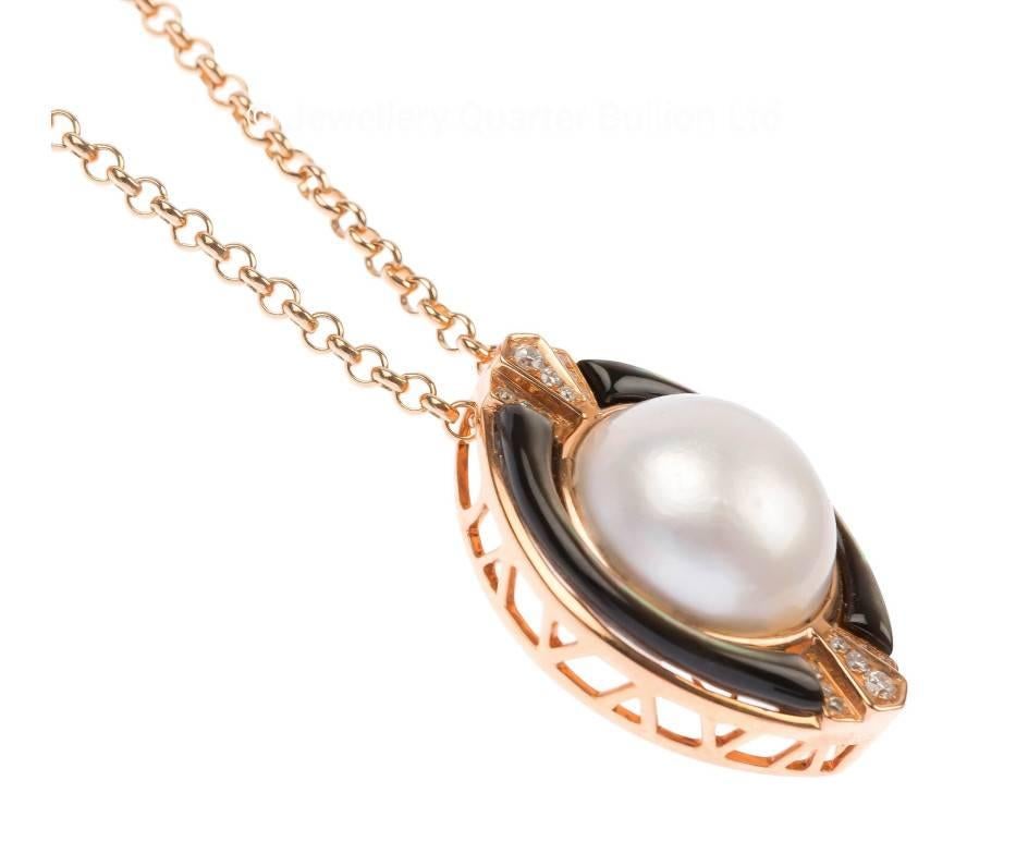 GEMMOLOGIST'S NOTES
A fabulous one off rose gold pendant, set with a magnificent 13.5mm Mabe pearl and highly polished black lip Mother of Pearl.  This gorgeous piece is set with approximately 0.15ct of scintillating diamonds. With matching earrings