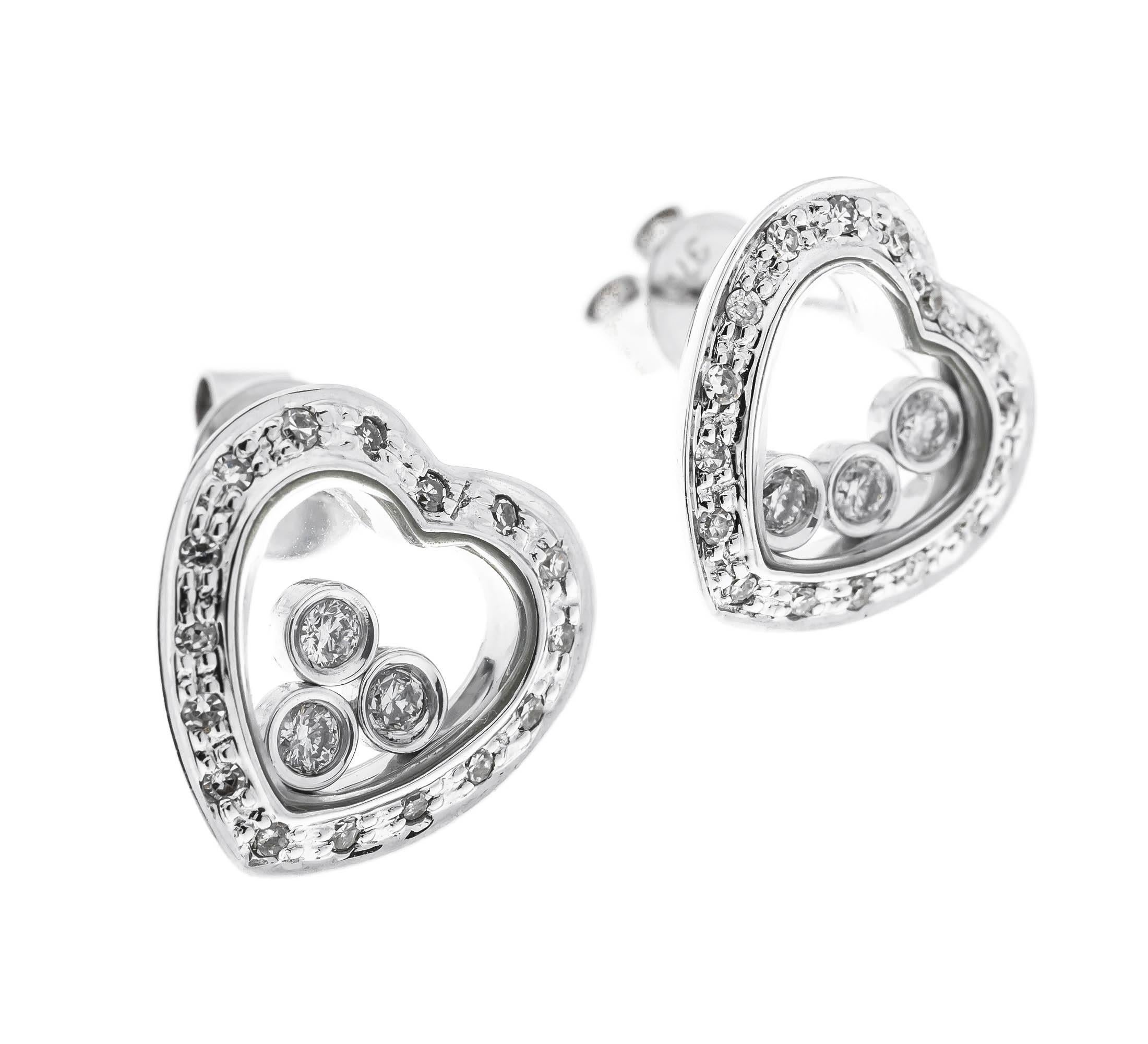 GEMMOLOGIST'S NOTES
These fabulous earrings, inspired by a Swiss designer.

Designed as a twinkling diamond heart, surrounding a glazed panel, that encases three freely moving diamonds. 

A gorgeous playful pair fo earrings, that are the perfect