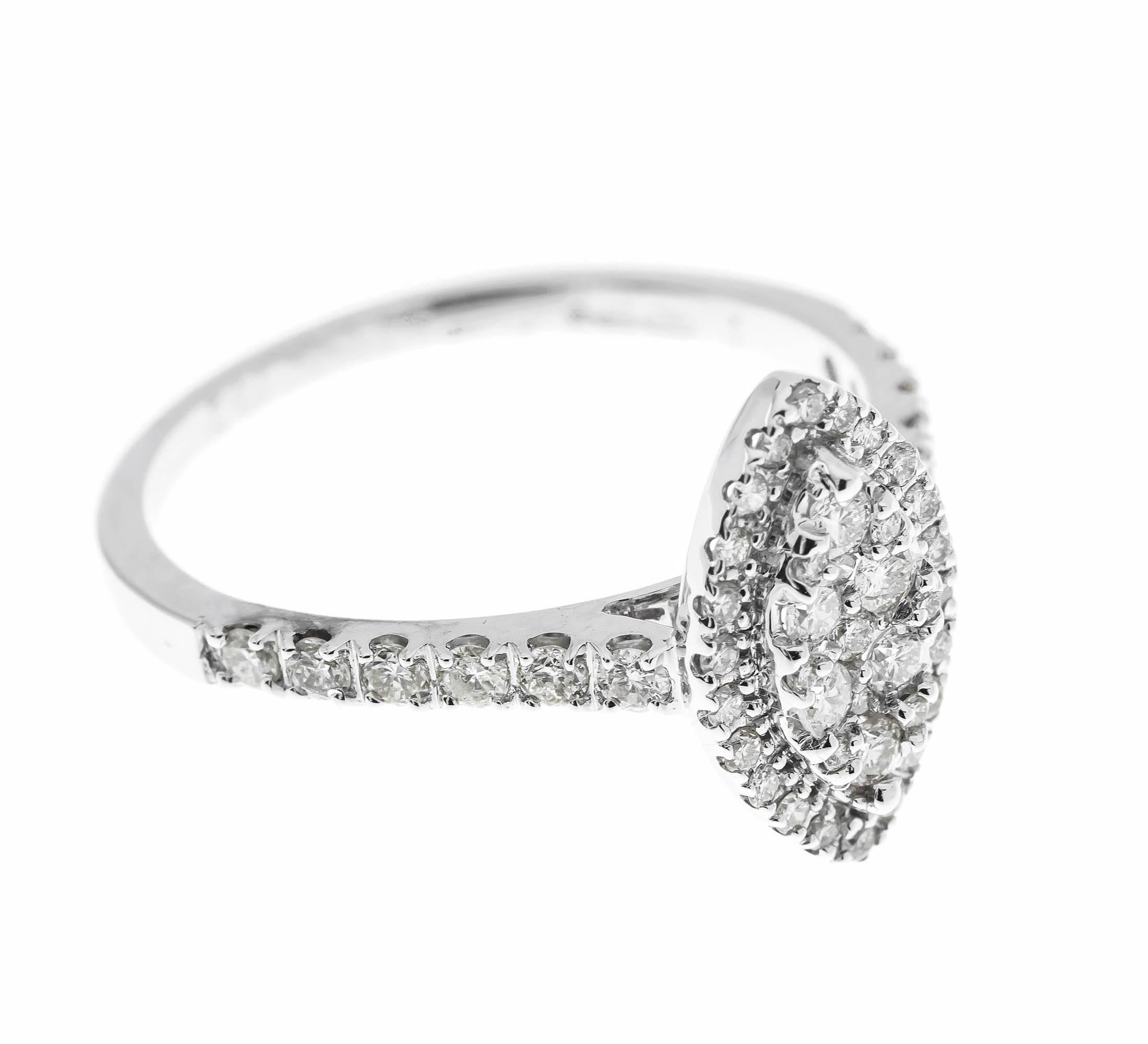 GEMMOLOGIST'S NOTES

This gorgeous ring, designed as a navette panel, encrusted with pave set twinkling diamonds. Designed to fit up flush against a wedding band or eternity ring of your choice.

A lovely piece, that catches the light beautifully