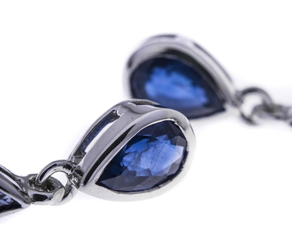 Simple and elegant sapphire drop earrings. Rub-over set, wear these as a something blue on your Wedding Day or wear as an every day office jewel.

SPECIFICATION
Weight (grams)	1.38
Fineness	9ct
Metal	White