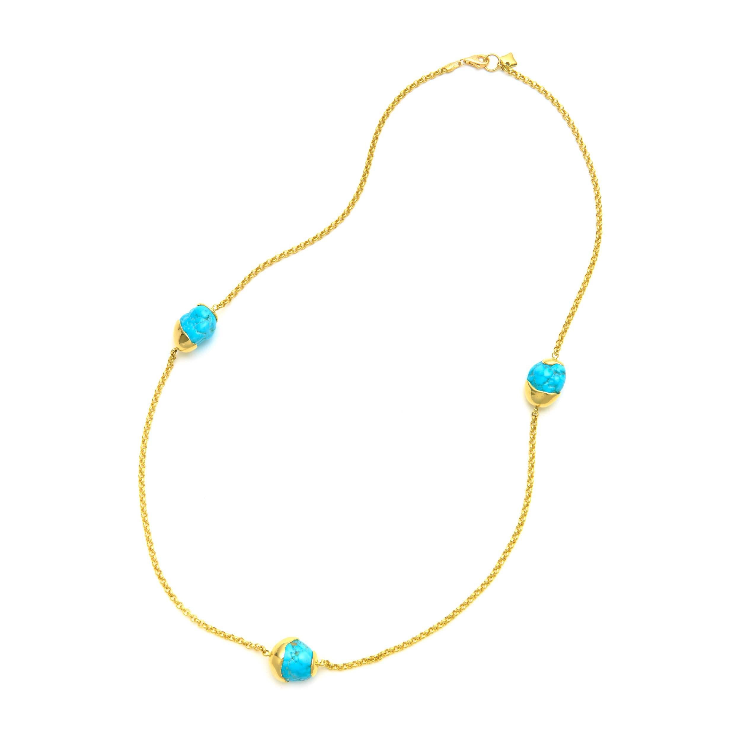 Our Tumbled Turquoise necklaces are 18kt solid yellow gold with tumbled turquoise and our exclusive thick Dodge chain. They come in three versatile lengths (40,60 and 70 cm) and are sold separately. We recommend wearing them layered for the