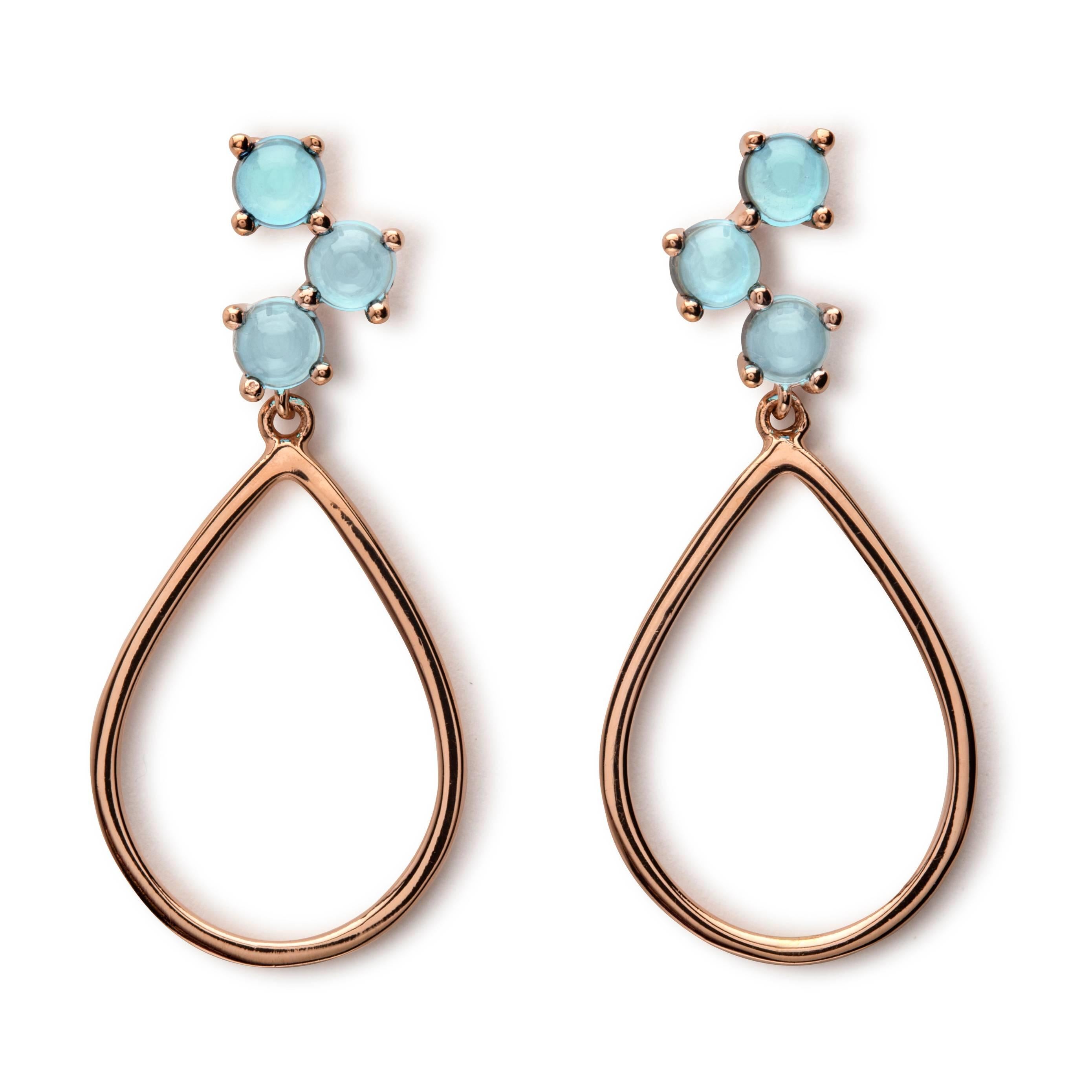 
These gorgeous drop earrings with three 4mm cabochon stones are everyday chic, dress them up or down. The total length of the earrings is 38mm, the gold metal is 2mm deep and they are 18mm at their widest point. Style them with our Skopelos