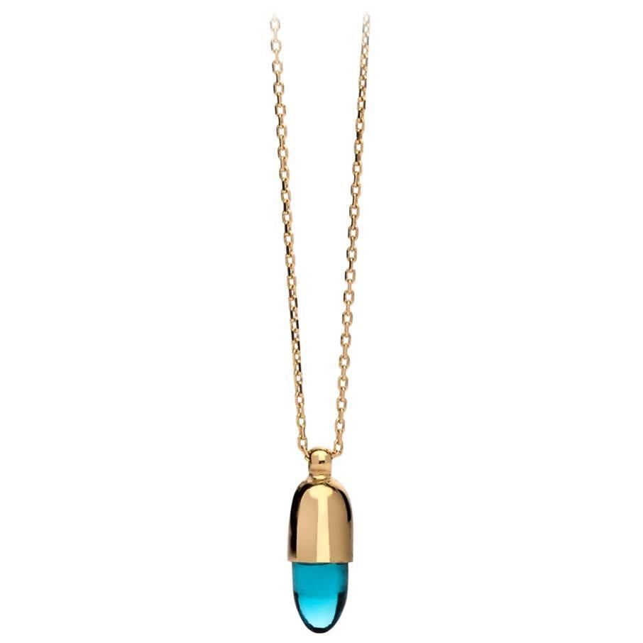 rose gold necklace with blue stone