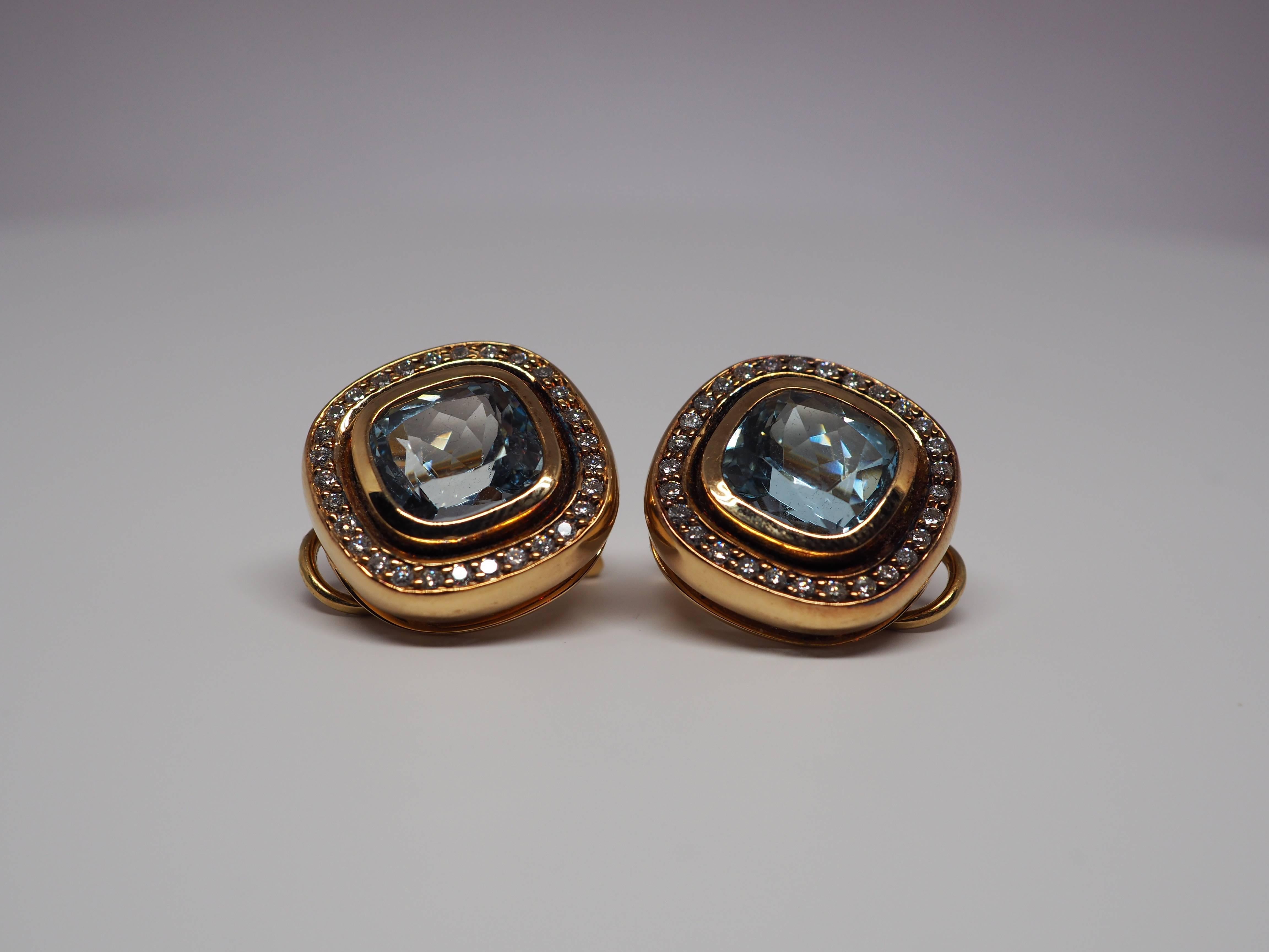 Thomas Leyser is renowned for his contemporary jewellery designs utilizing fine gemstones.

This 18k rose gold (27.06g) pair of earrings has 2 top quality Aquamarines, facetted in cushion shape (10x10mm, 8.50ct) + 60 diamonds G/VS round (1.4mm,