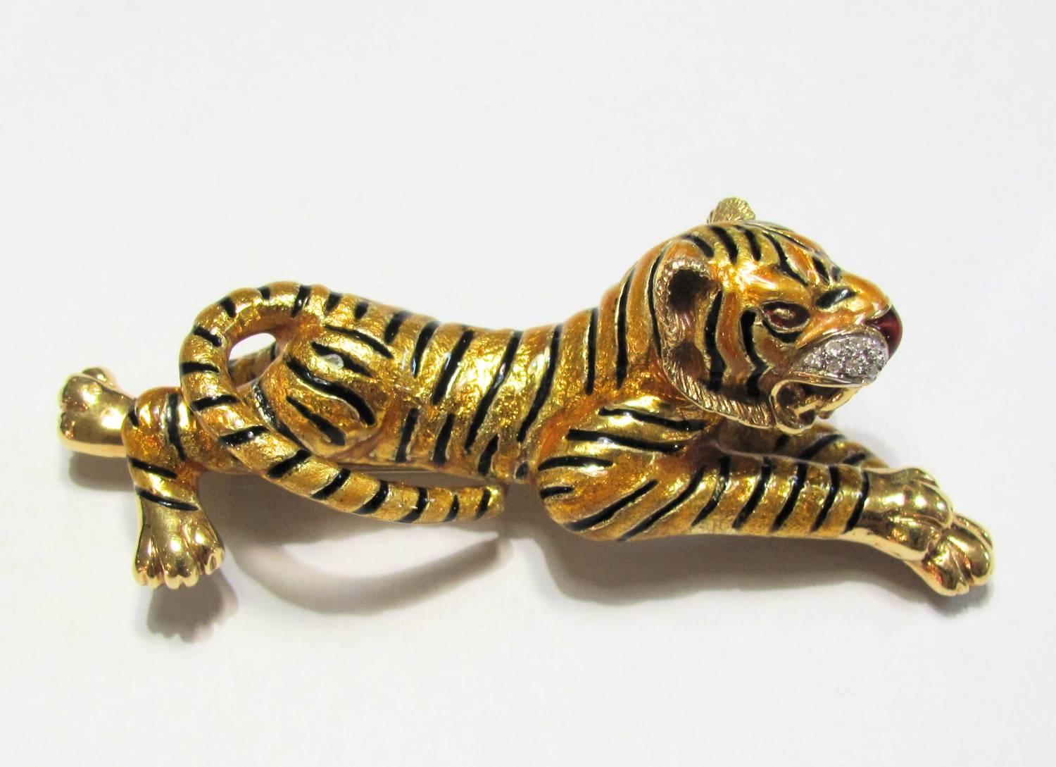 Fantastic '60 Frascarolo tiger brooche with yellow and black enamel for the body of the tiger and red enamel for the nose. Diamonds for the mustache. 