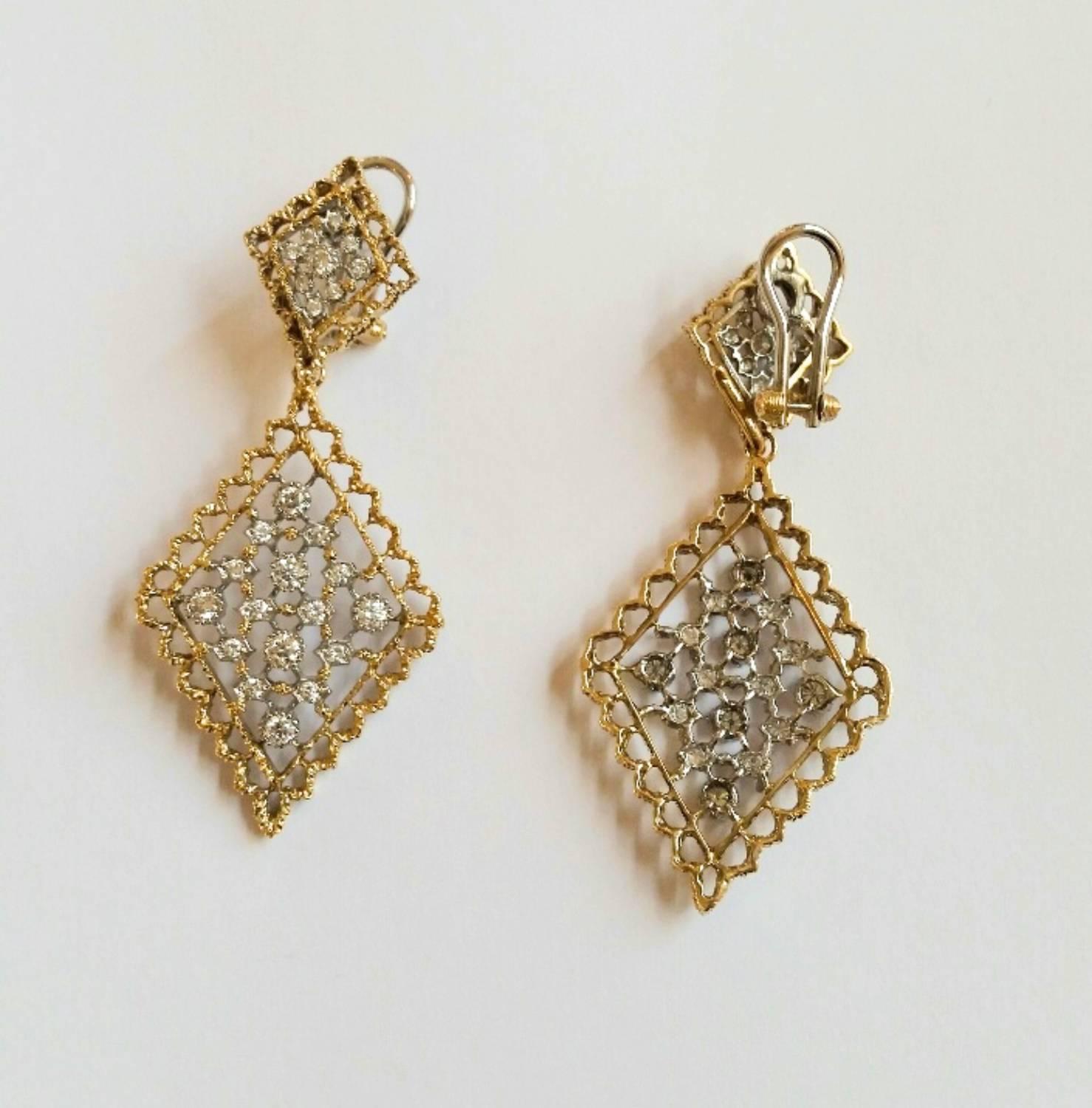 '70 Mario Buccellati long design earrings 18 kt gold and diamonds about kt.1,80 totally hand made " tulle " work.







