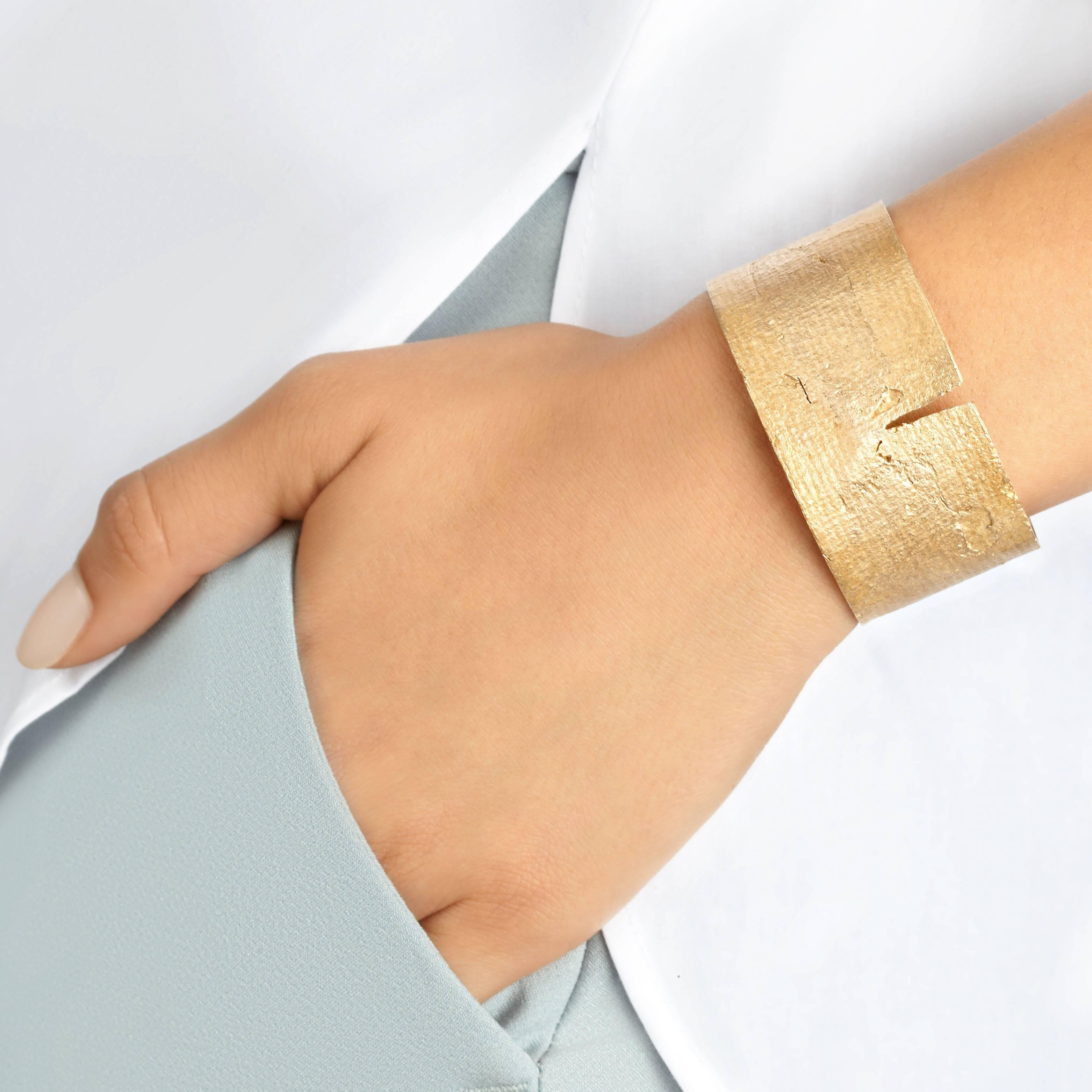 Crafted in solid, glowing bronze, the Split Mega Cuff is a subtle statement piece for every day. The unique texture and split detail add interest to this classic wide cuff. 

Every piece in this collection is individually hand-crafted in paper and