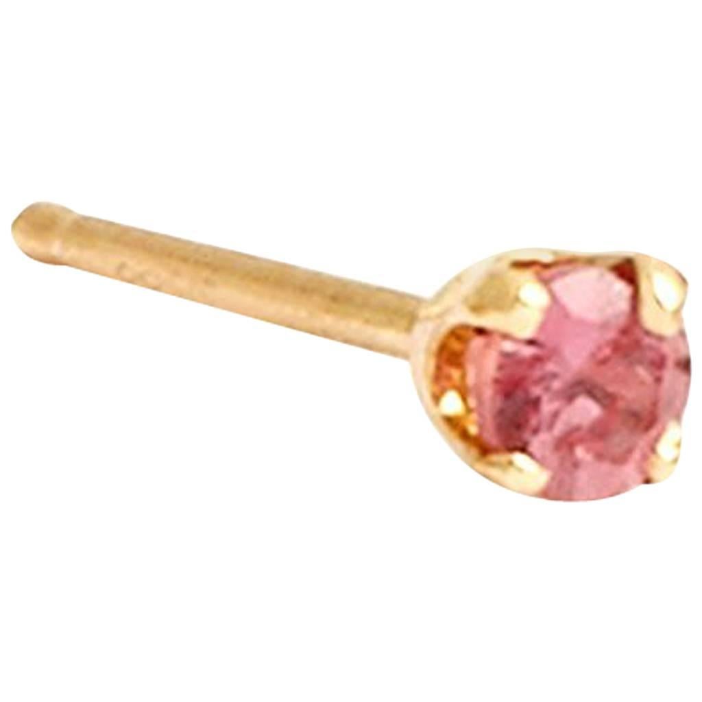 Pale pink Padparascha sapphire stud earrings in the tiniest size of our range of delicate stud earrings, set in 9-carat yellow gold. This matched pair of studs features a 0.02 carat round brilliant cut naturally pale pink Padparadscha sapphire from