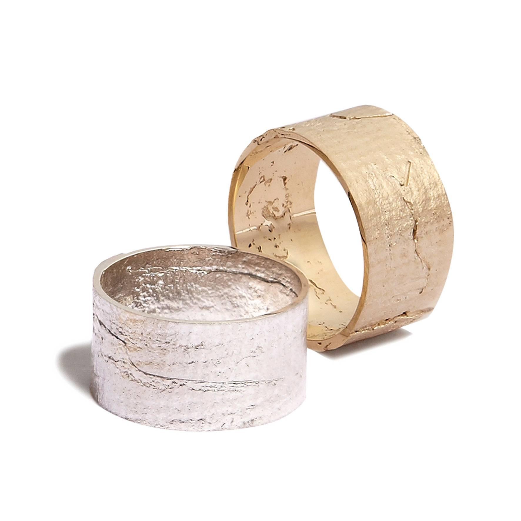 This textured band ring crafted in solid 9-carat gold has a unique shimmering texture on the exterior and a high polish finish on the inside and sides for a comfortable fit.  This ring is made to order; please allow 3 weeks for production.  This