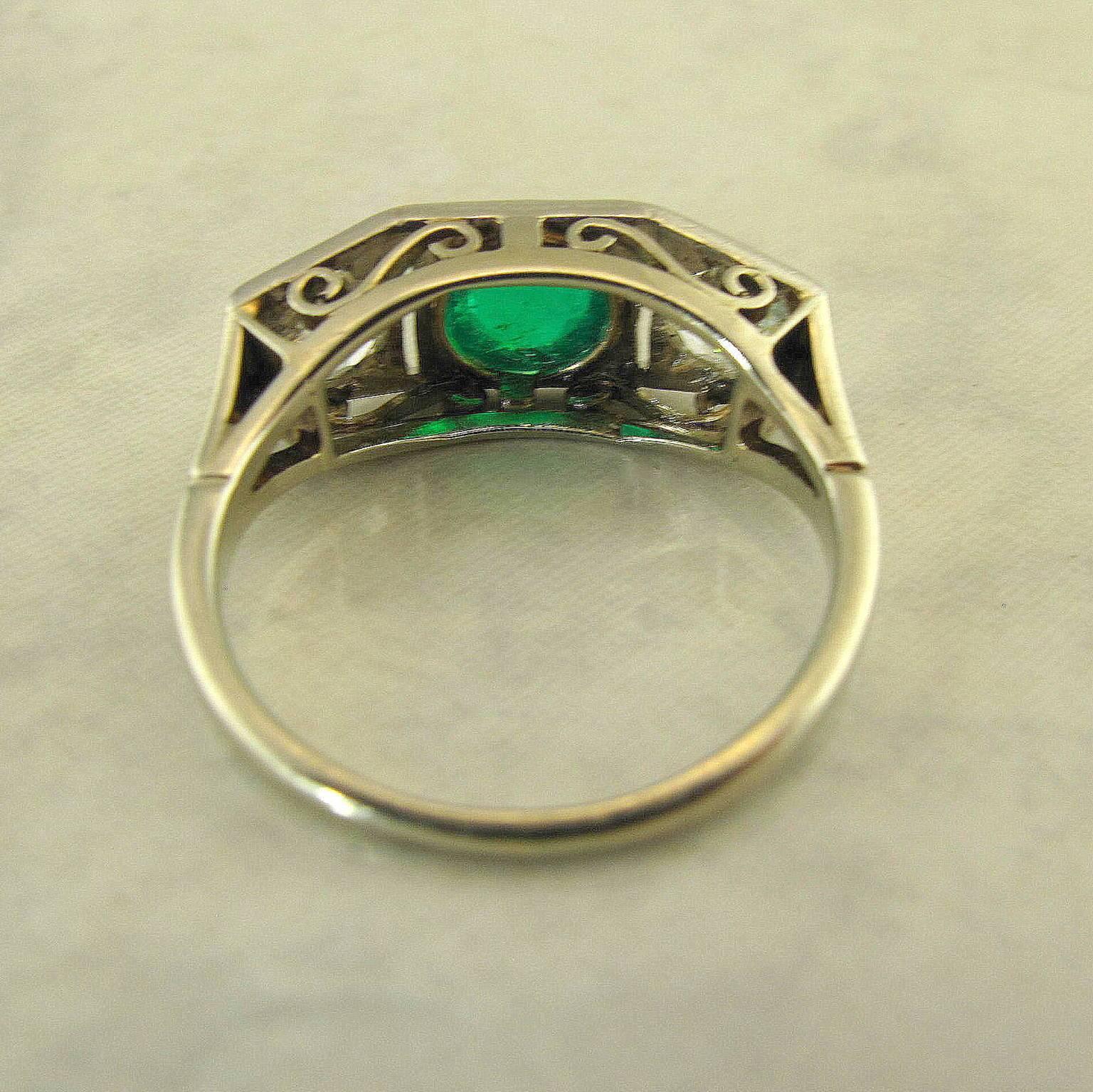 Women's Art Deco Emerald Diamond Platinum Three-Stone Ring For Sale