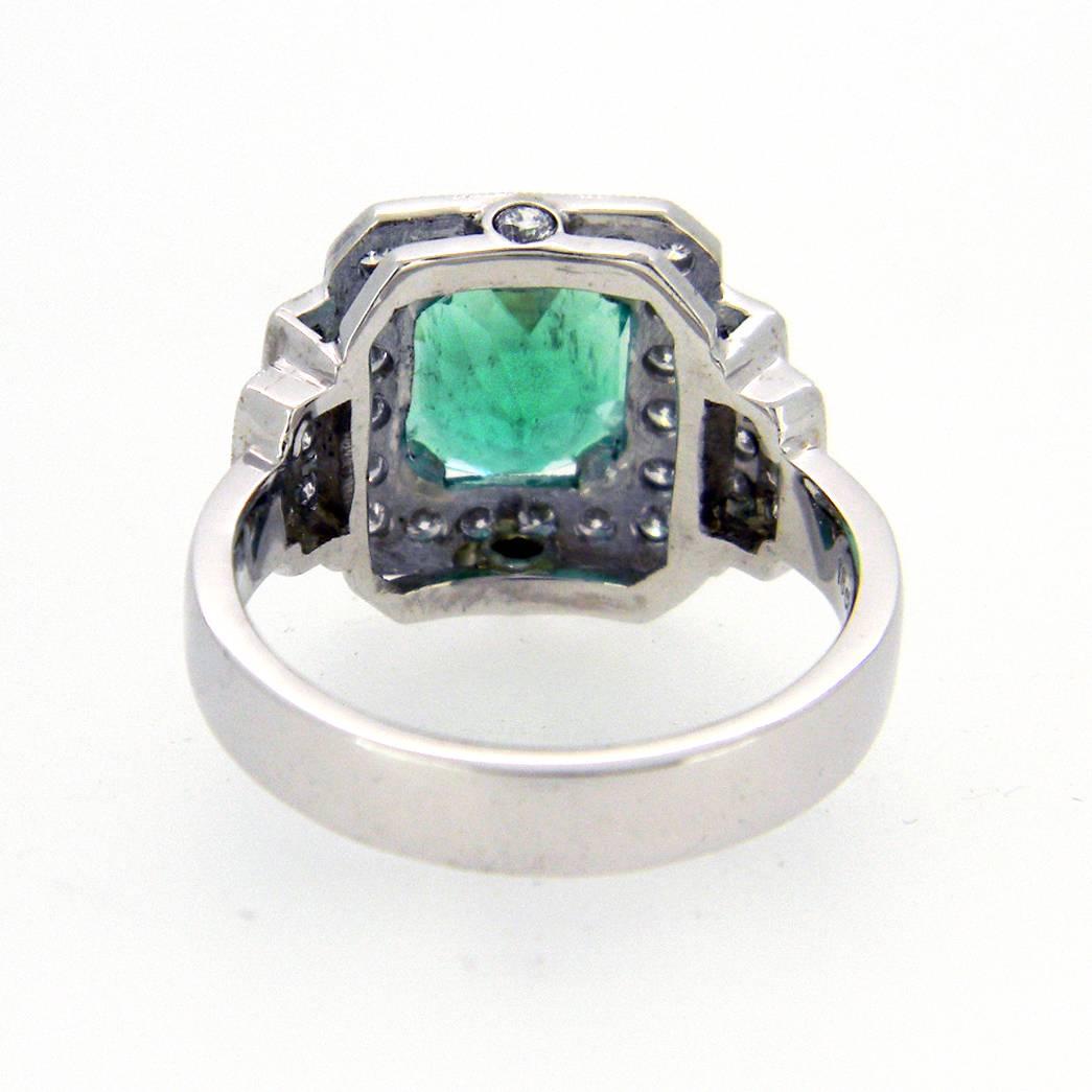 Art Deco 3.07 Carat Emerald Diamond White Gold Halo Ring For Sale