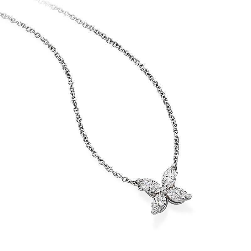 The elegant simplicity of this pendant makes it as appropriate for day as it is for evening.

Platinum with marquise diamonds. 
4=0.46cts F/G Vs
Size: Medium, on a 16" chain

Pendant size approx. 8x8mm