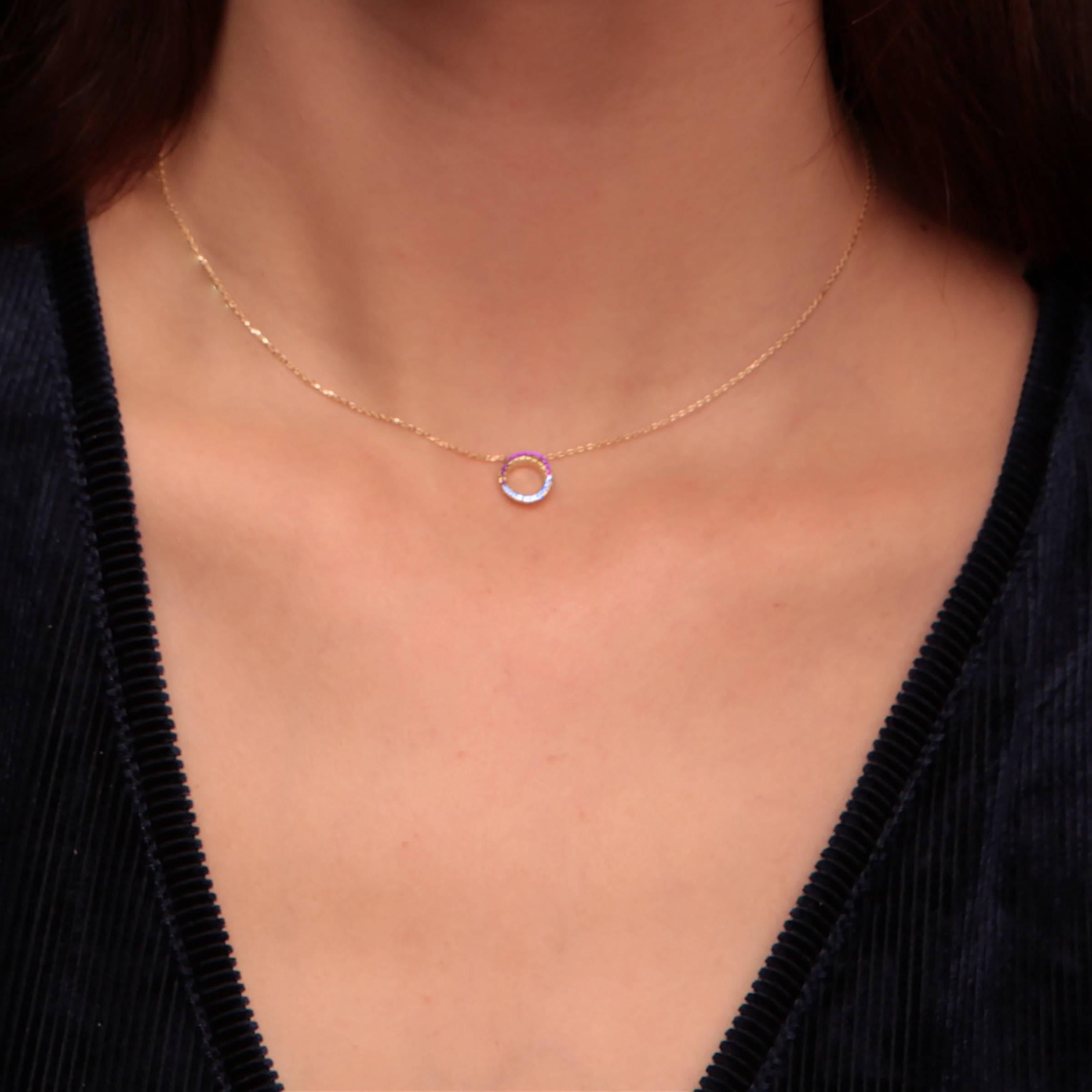 The delightful Claire necklace is a part of the exquisite 18kt gold collection. The half and half combination of pink and blue sapphires represent in this collection the phases in life that form the halo.
The lovely necklace is your daily to go