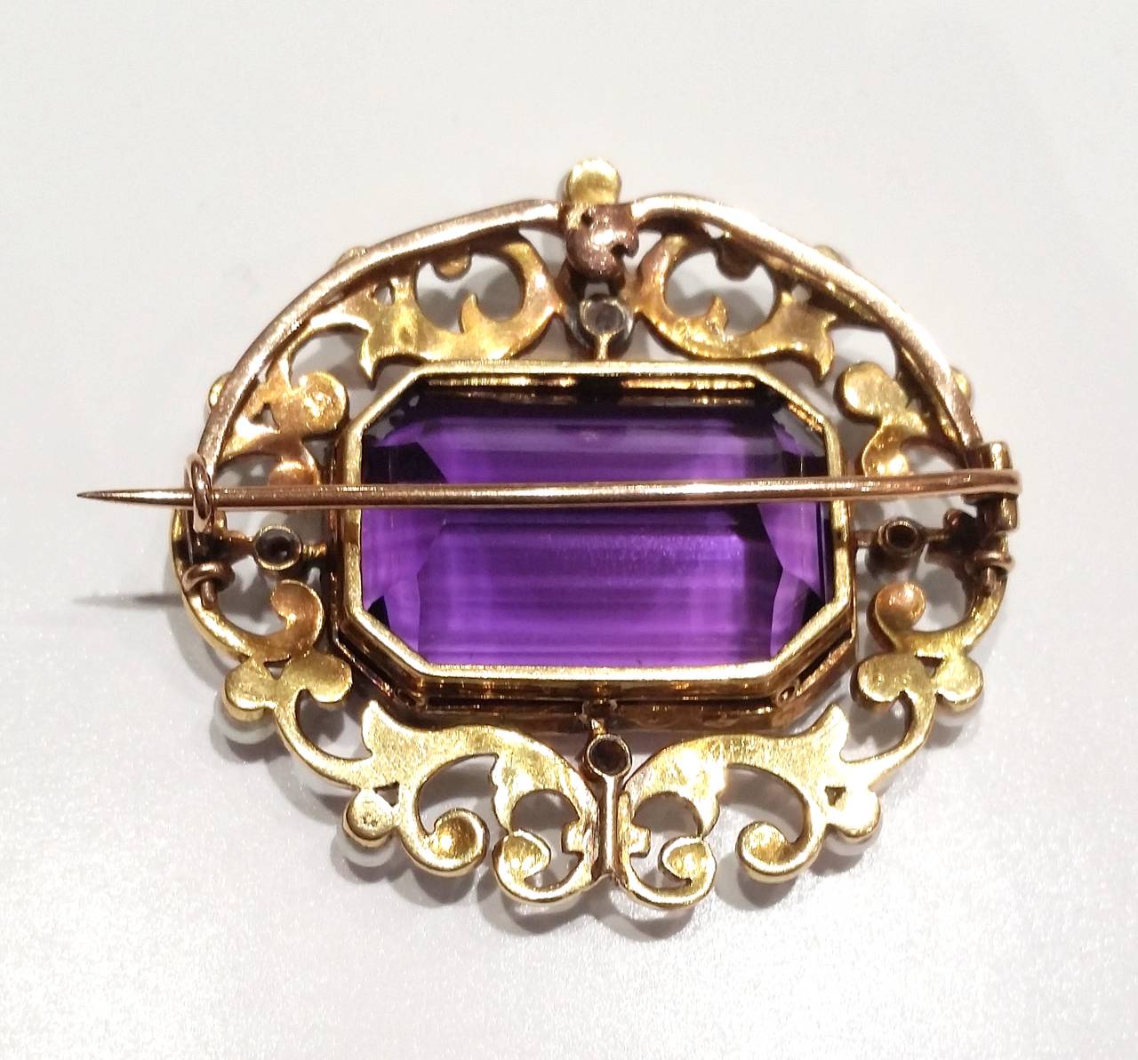 amethyst brooch meaning