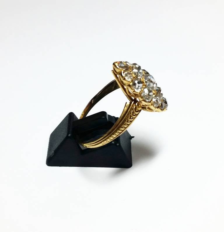 Delicate navette shaped ring in yellow gold and old cut diamonds (total weight 3ct approx.) 

SIZE: EU 18 / US 58
