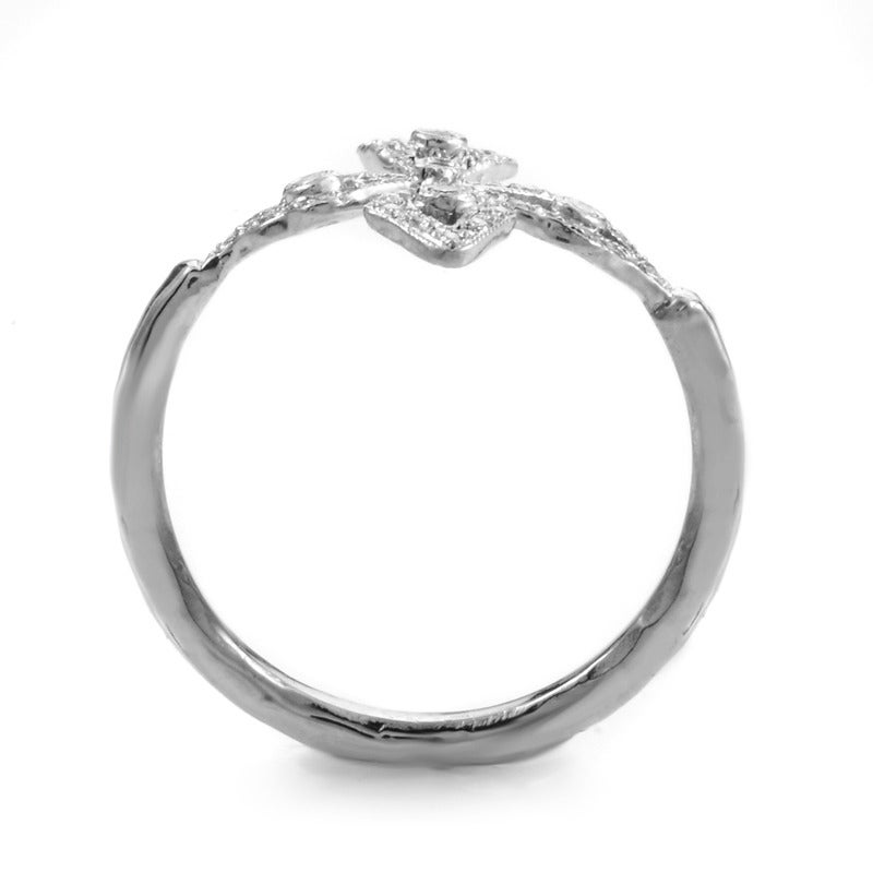 Ethereal and absolutely divine, this simple ring from Cathy Waterman has an elegant look that will be treasured for many years to come. The ring is made of platinum and boasts a flower-shaped motif set with ~.20ct of diamonds.
Ring Size: 6.5 (52