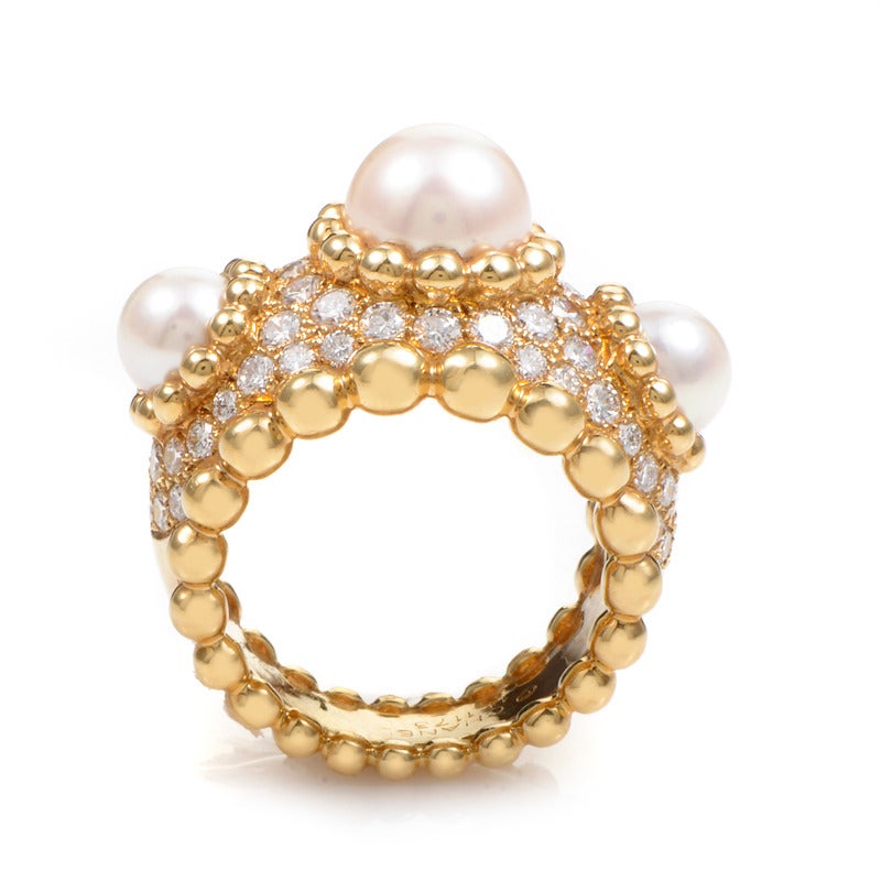 A ring as luxurious as this could have only come from the House of Chanel. The ring is made of burnished 18K yellow gold and is partially paved with ~1.50ct of diamonds. Lastly, three lustrous white pearls add to the already lavish design.
Ring