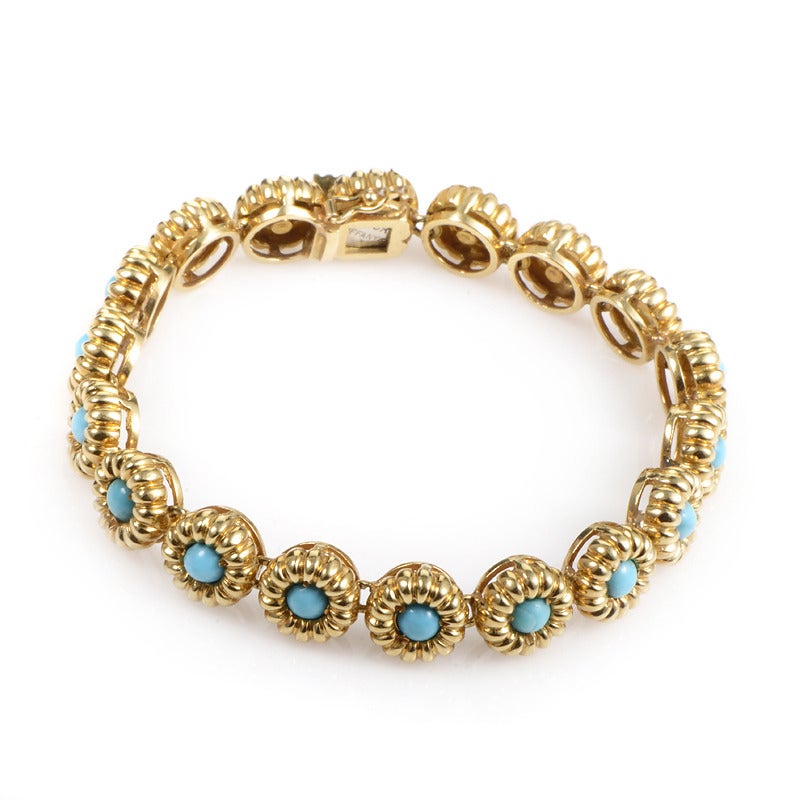 Brilliant blue turquoise stones paired with glistening gold makes this bracelet from Tiffany & Co an absolute delight to behold as well as to wear. The bracelet is made of carved 18K yellow gold flowers set with turquoise stones.