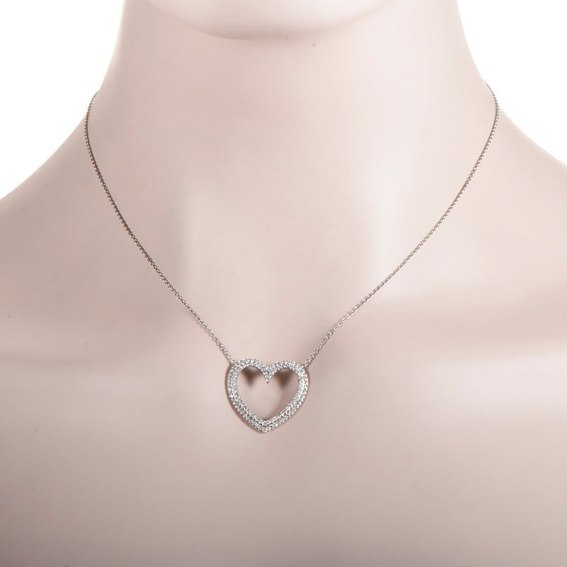 A gorgeous design from Tiffany & Co.'s Metro Collection, this pendant necklace is the perfect gift for someone special. The necklace is made of platinum and boasts an open-heart shaped pendant set with ~.43ct of diamonds.
Approximate Dimensions: