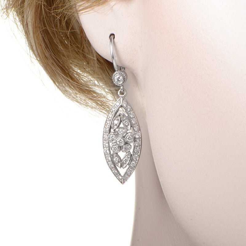 This pair of earrings from Penny Preville have a dainty design that exudes elegance and class. The earrings are made of 18K white gold and boast a floral design encrusted with white diamonds.
Diamond Carat Weight: 0.75
