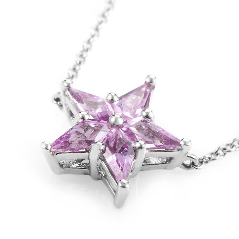 Pretty and pink, this petite pendant necklace is sure to please! This adorable design from Tiffany & Co. is made of platinum and features a star-shaped pendant made of kite-cut pink sapphires.

Approximate Dimensions: Drop of the Necklace: 8.00