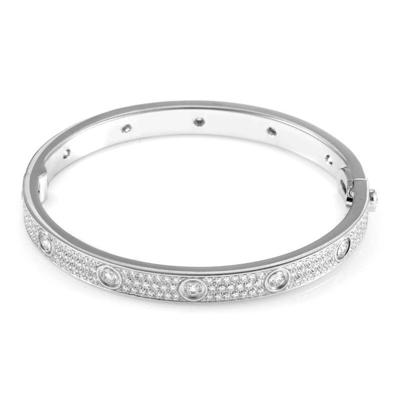 The LOVE collection from Cartier is world-renowned for its exceptional array of jewelry and this design may be one of the collection's most exceptional. This bracelet is made of 18K white gold and is set with a full diamond micro-pave. Lastly, in