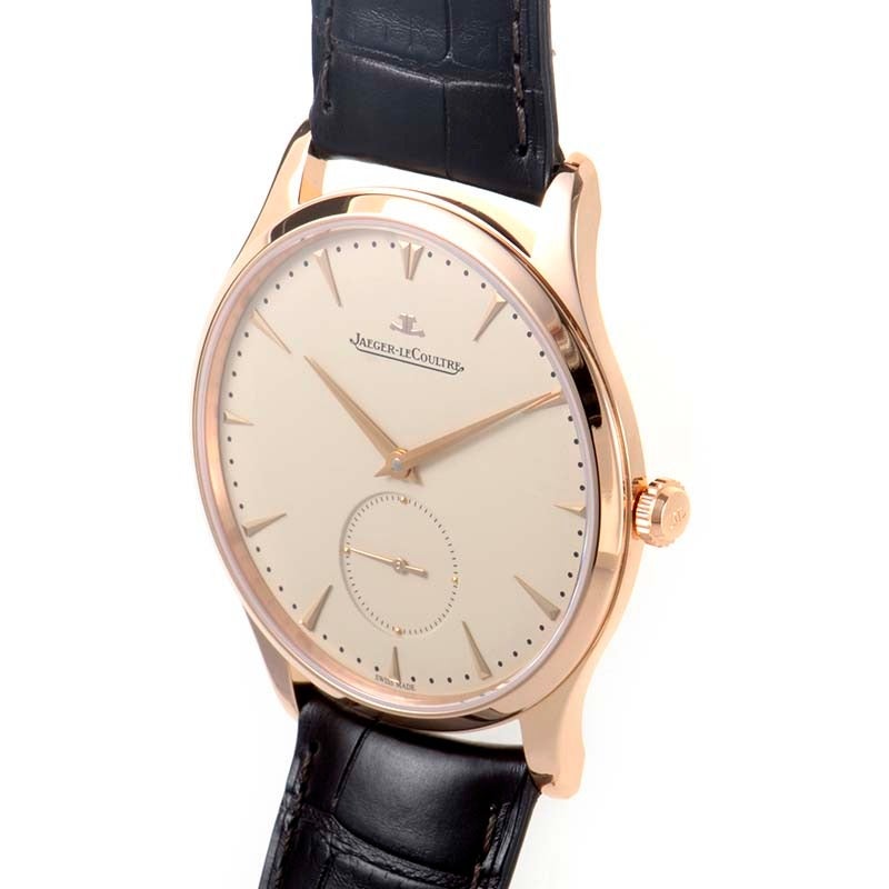 Jaeger LeCoultre 18K rose gold automatic wristwatch on a black crocodile leather strap. Watch indicates hours, minutes, subsidiary seconds on a beige dial with applied rose gold index markers. Watch resists water to ~50m / 165ft.

Included Items: