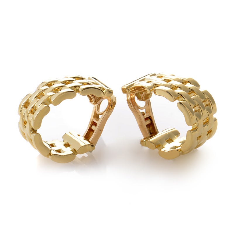 This pair of huggie earrings from Cartier has a classic design which will remain en vogue for many years to come. The earrings are made entirely of 18K yellow gold and sport a lovely basket-weave design.