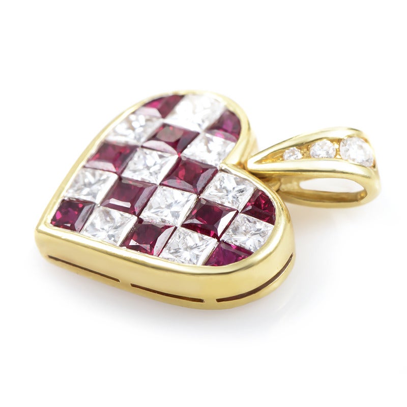Classically designed but with a twist, this Tiffany & Co. pendant is sure to please! Made of 18K yellow gold and shaped like a heart, this pendant truly radiates with the gleam of ~1.35ct of diamonds and ~1.10ct of rubies.