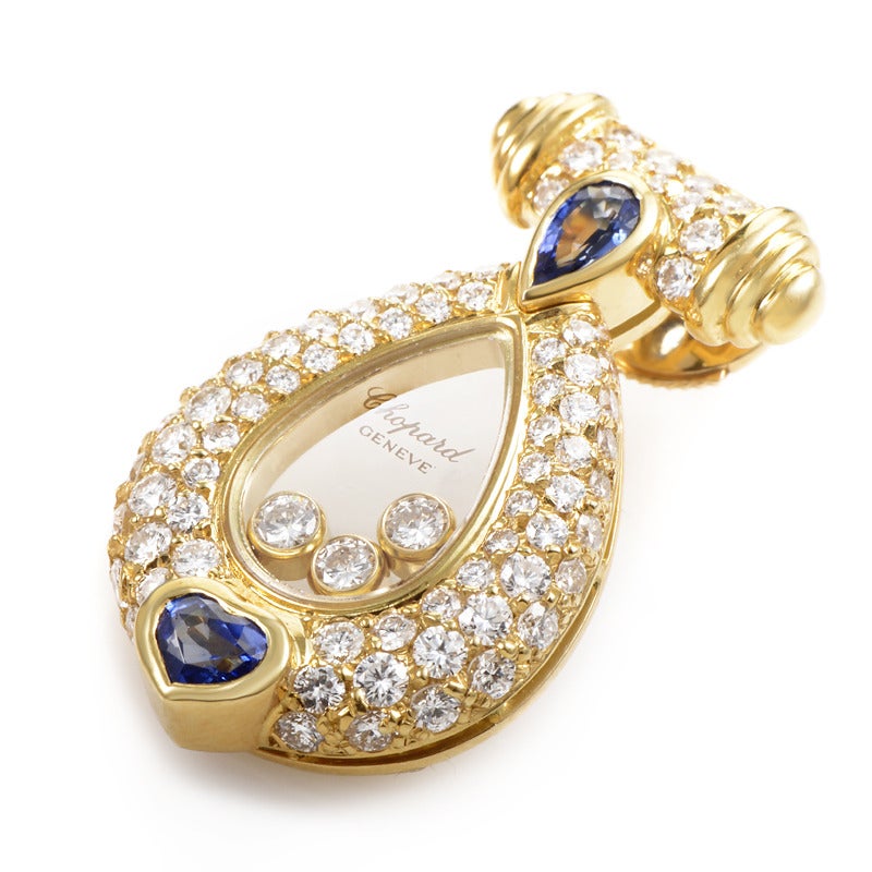 This stunning Chopard set of earrings is a perfect example of a majestic appearance that can be achieved when combining exquisite designers and craftsmen and high quality materials. The earrings are primarily made of 18K yellow gold, featuring a